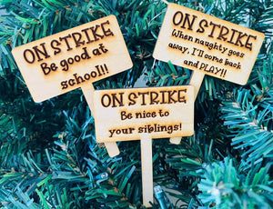 Elf On Strike Signs